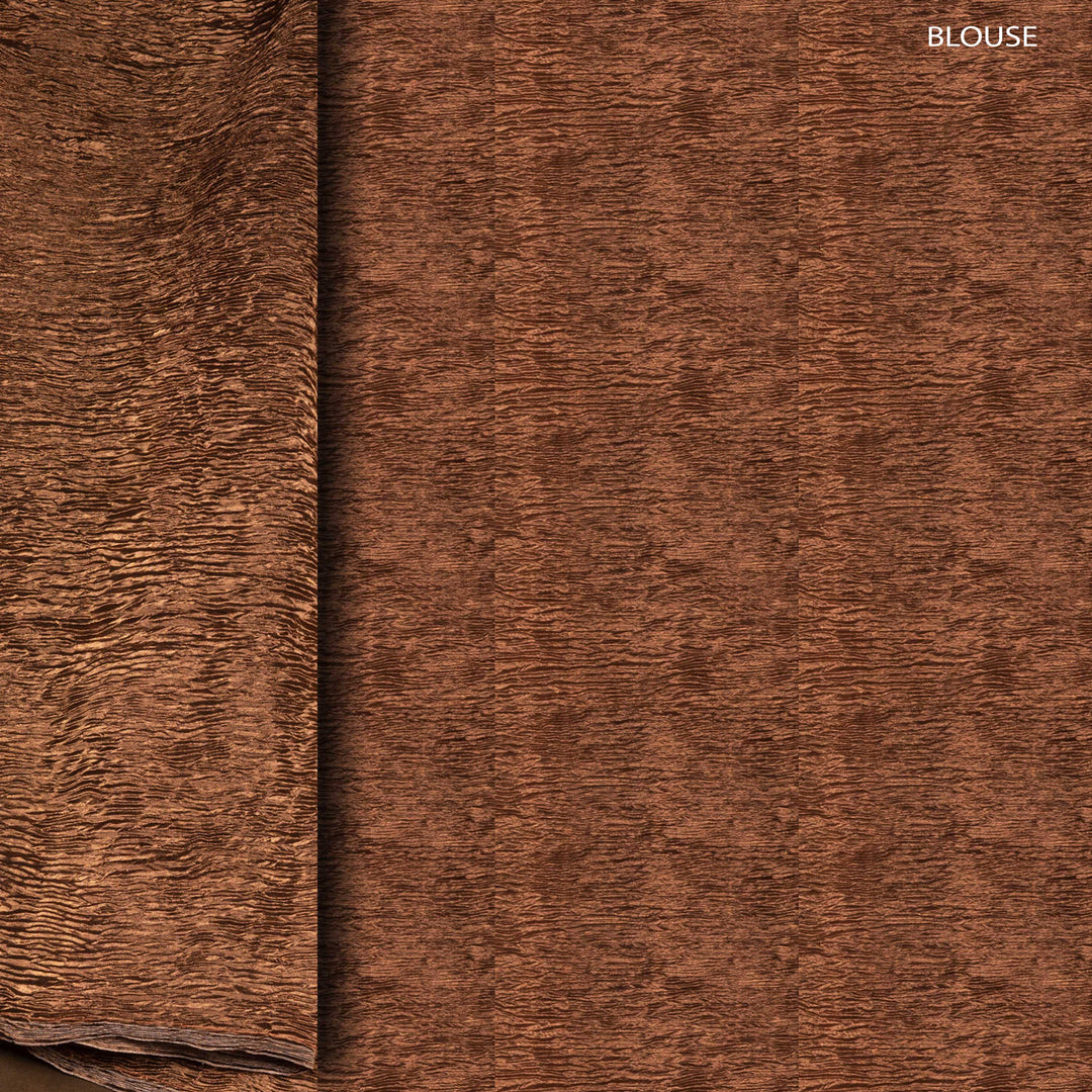 Blouse Closeup of a Black Dupion silk saree with copper tissue pallu.