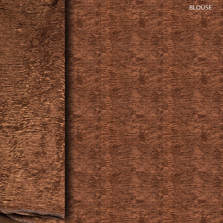 Blouse Closeup of a Black Dupion silk saree with copper tissue pallu.