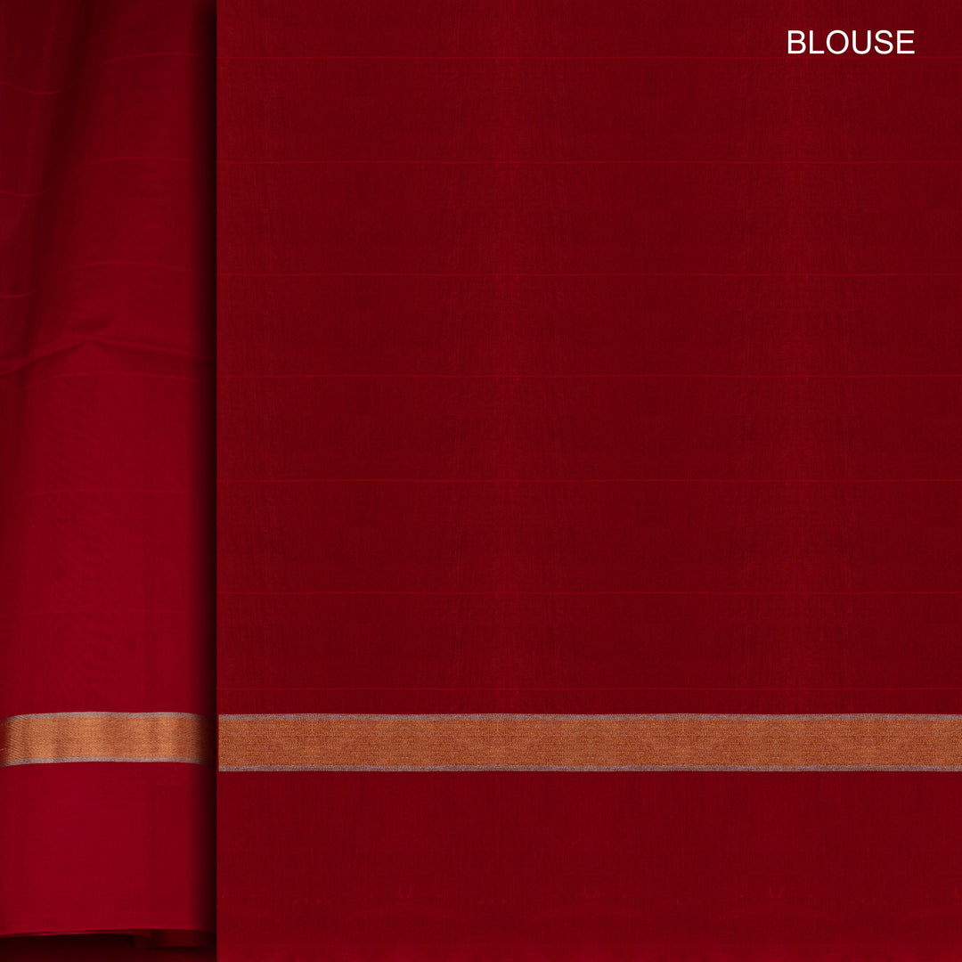 Blouse closeup of a Peacock blue silk cotton saree with wine border and red zari pallu.