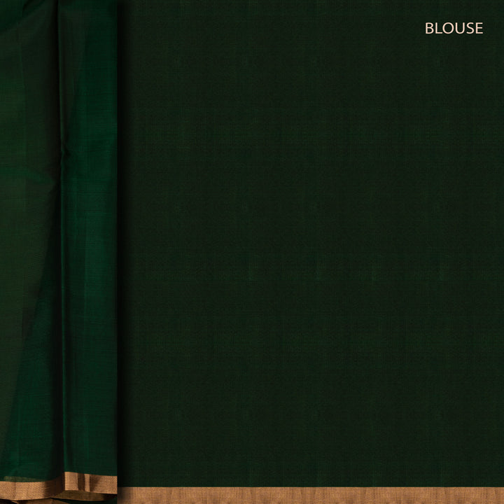 Blouse closeup of a Multicolor silk cotton saree with green pallu and gold zari florals.