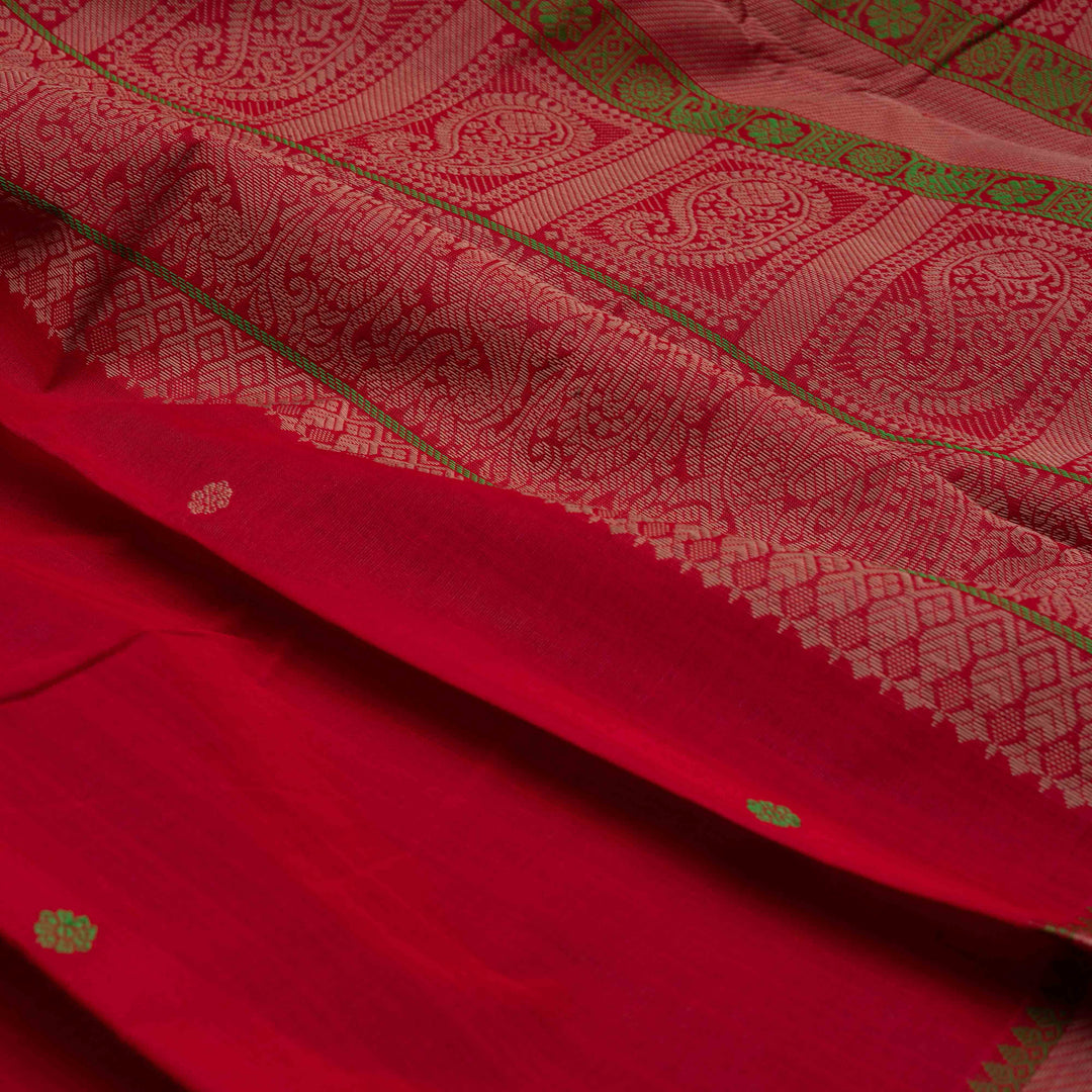 Red Kanchi cotton saree with chakram butta, diagonal border and rich traditional pallu with matching blouse
