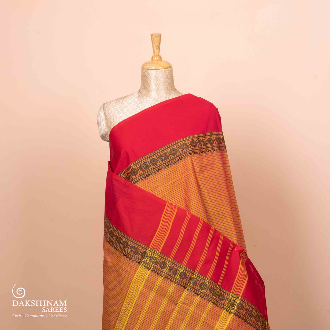 Pleats/body of Handwoven Orange with red border Chettinad Cotton Saree