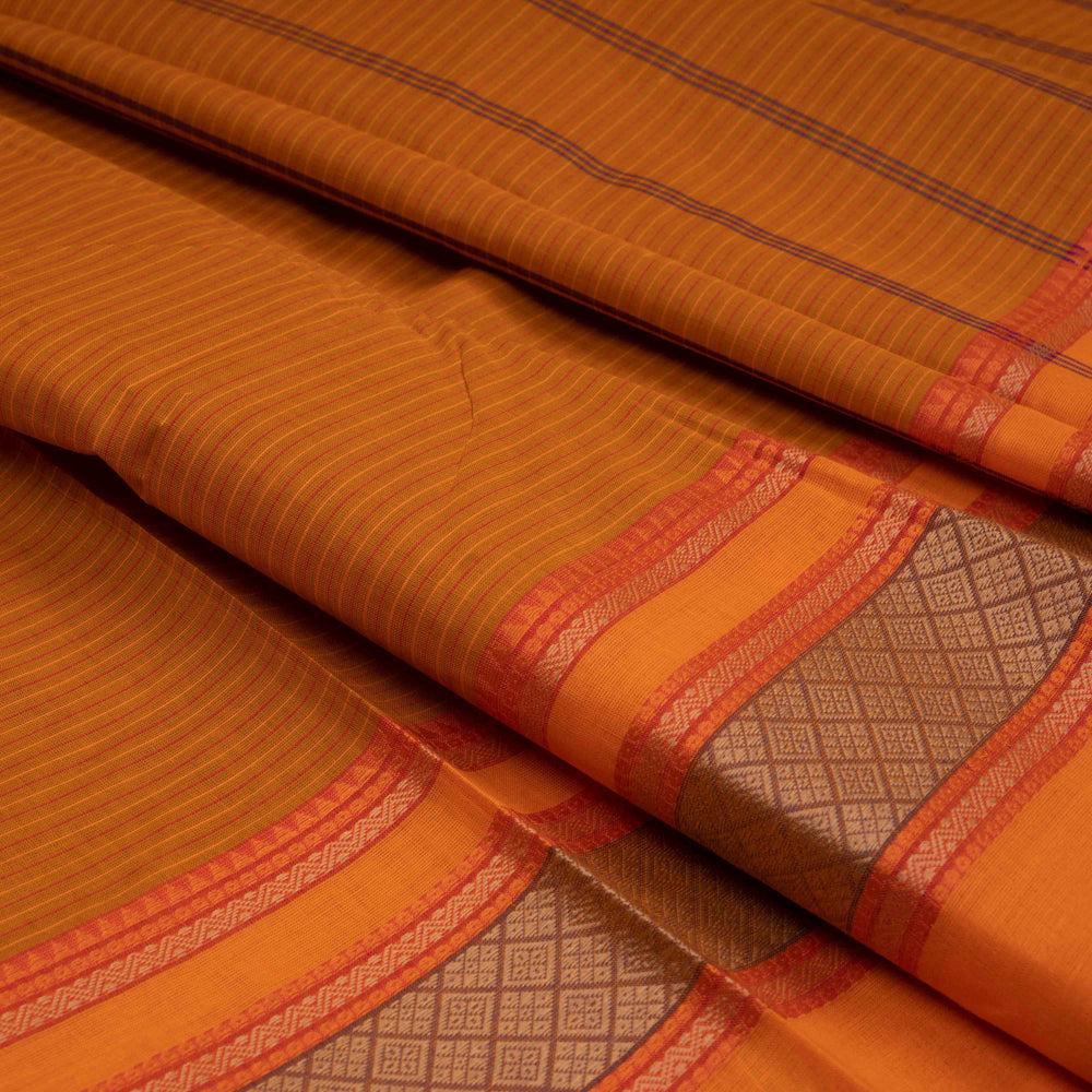 Closeup of Handwoven Grey with Orange border Chettinad Cotton Saree