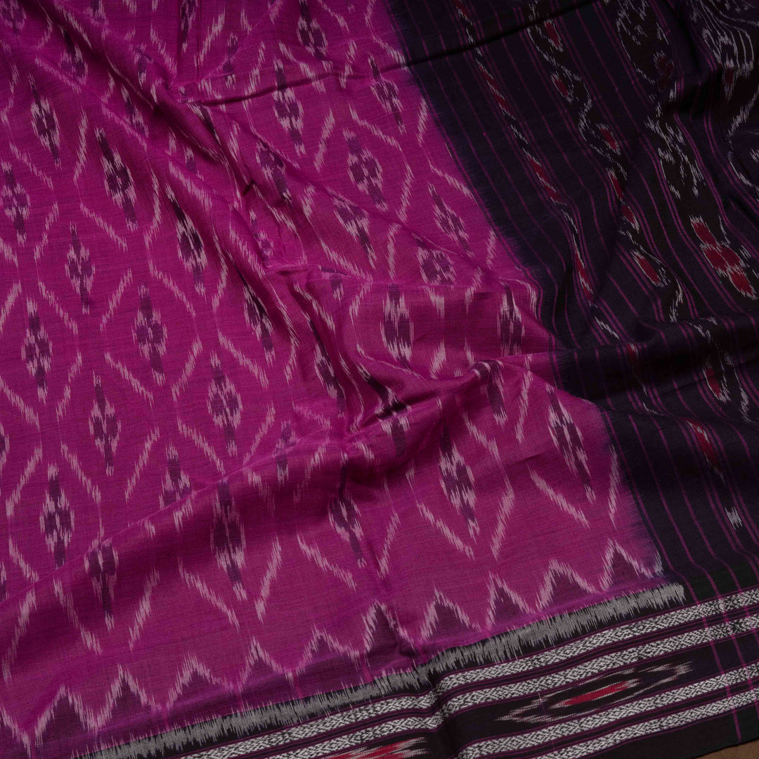 Closeup of Handwoven Pink with deep brown Ikat Cotton Saree