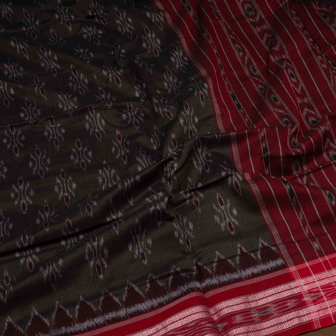 Closeup of Handwoven Grey with Red Ikat Cotton Saree