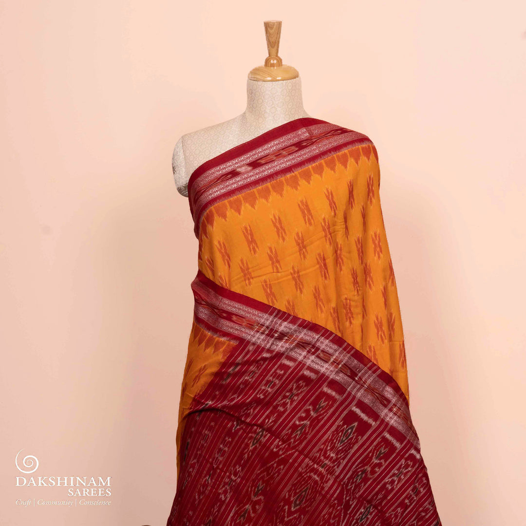 Pleats/body of Handwoven light orange with maroon Ikat Cotton Saree