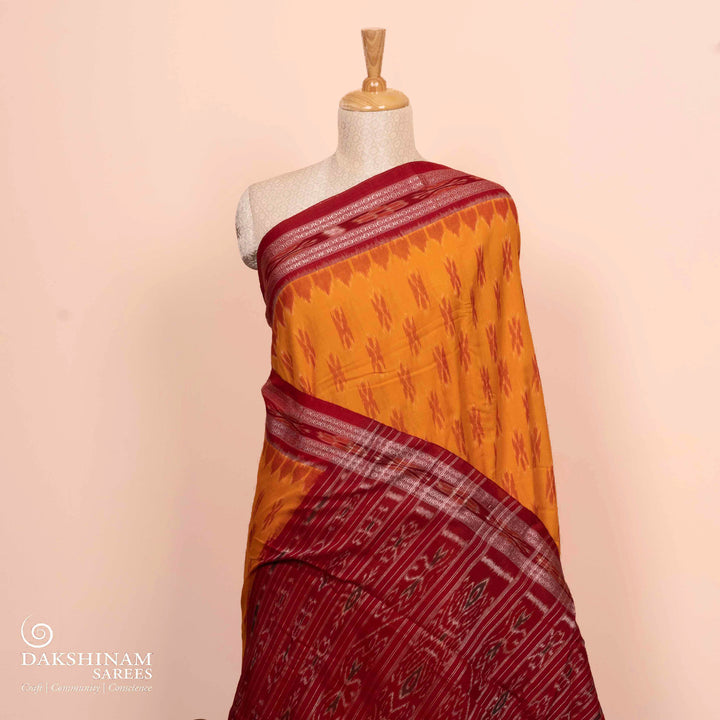 Pleats/body of Handwoven light orange with maroon Ikat Cotton Saree