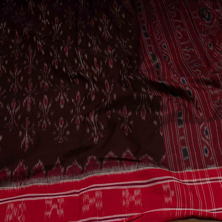 Closeup of Handwoven brown with red Ikat Cotton Saree