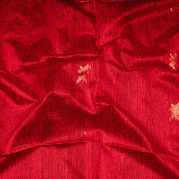 Red fabric with gold embroidery patterns