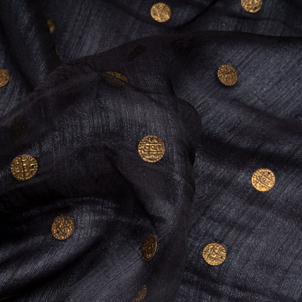Navy fabric with gold circular patterns