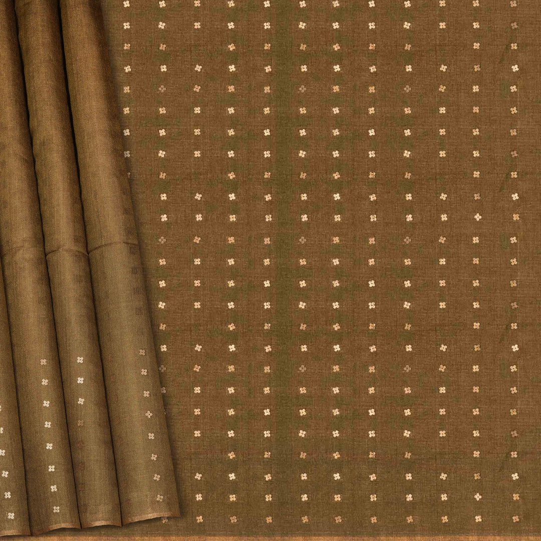 Brown fabric with a subtle pattern, possibly a curtain or textile sample.