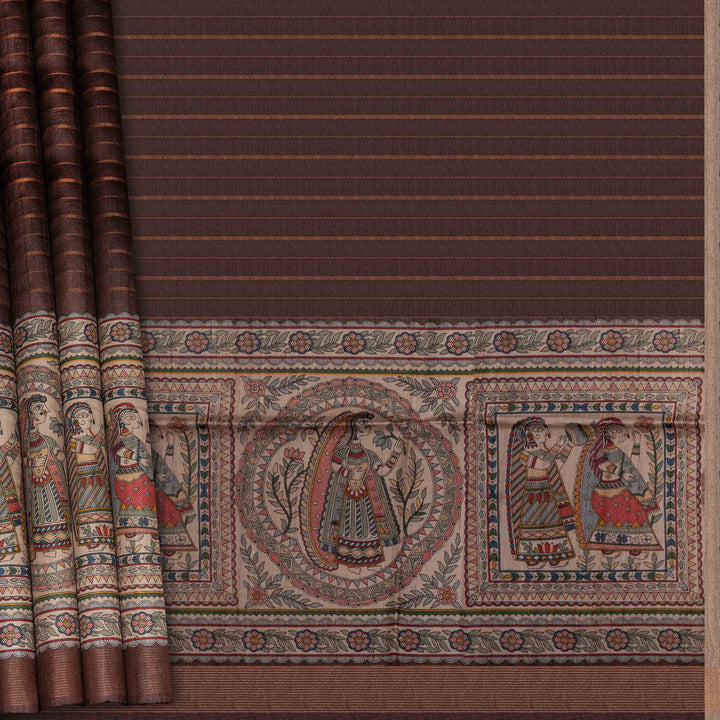 Textile with intricate patterns and figures on a brown background