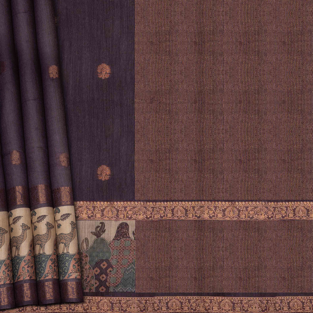 Brown fabric with intricate patterns and designs, including animals and people.