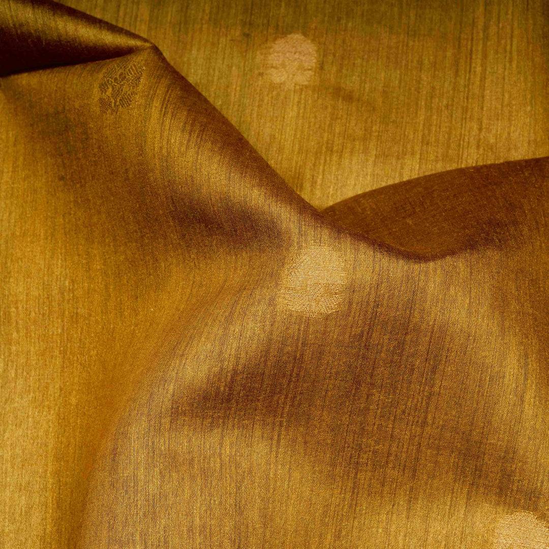 Closeup of Handwoven Mustard kora Tussar silk Saree