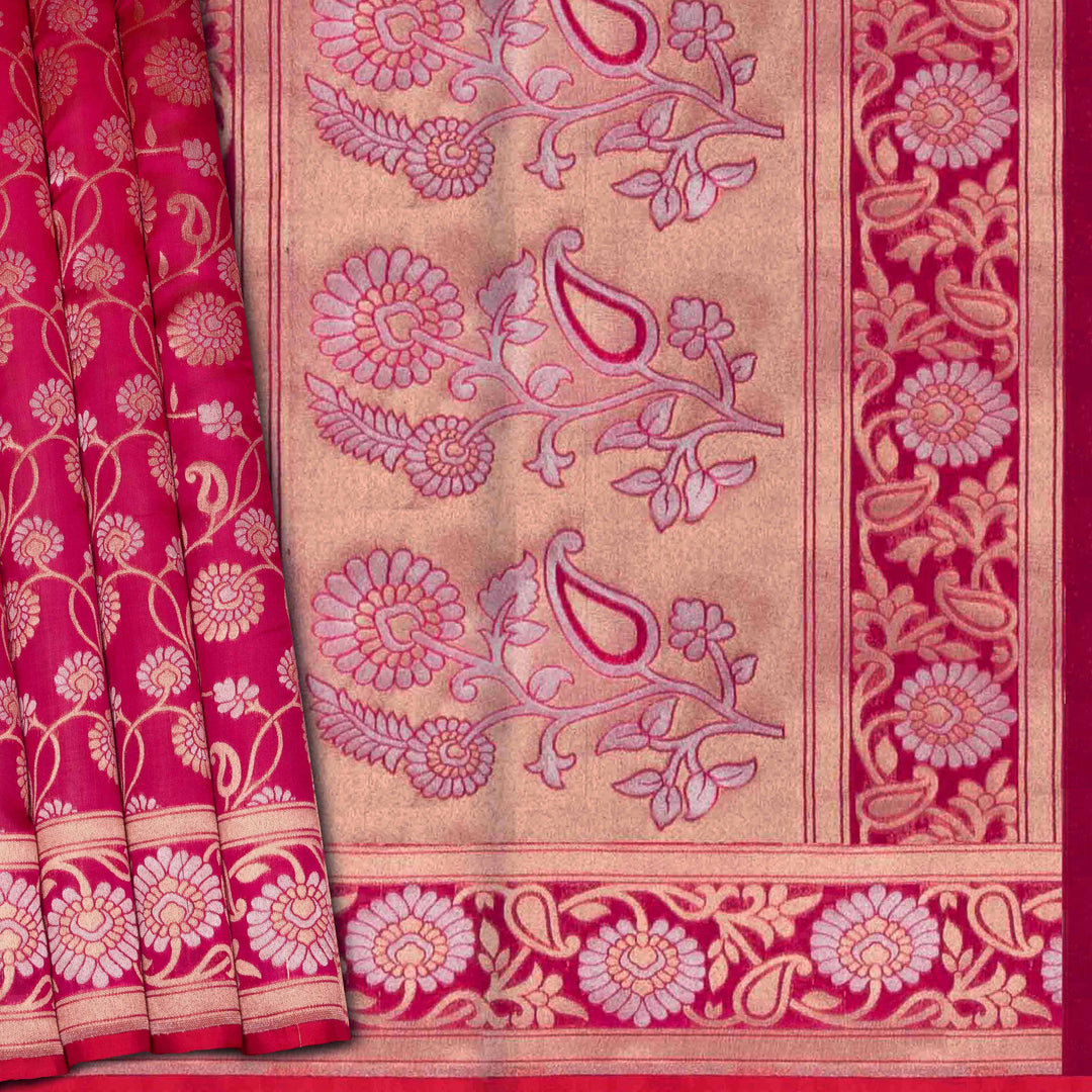 Decorative fabric with pink and gold floral patterns on a red background