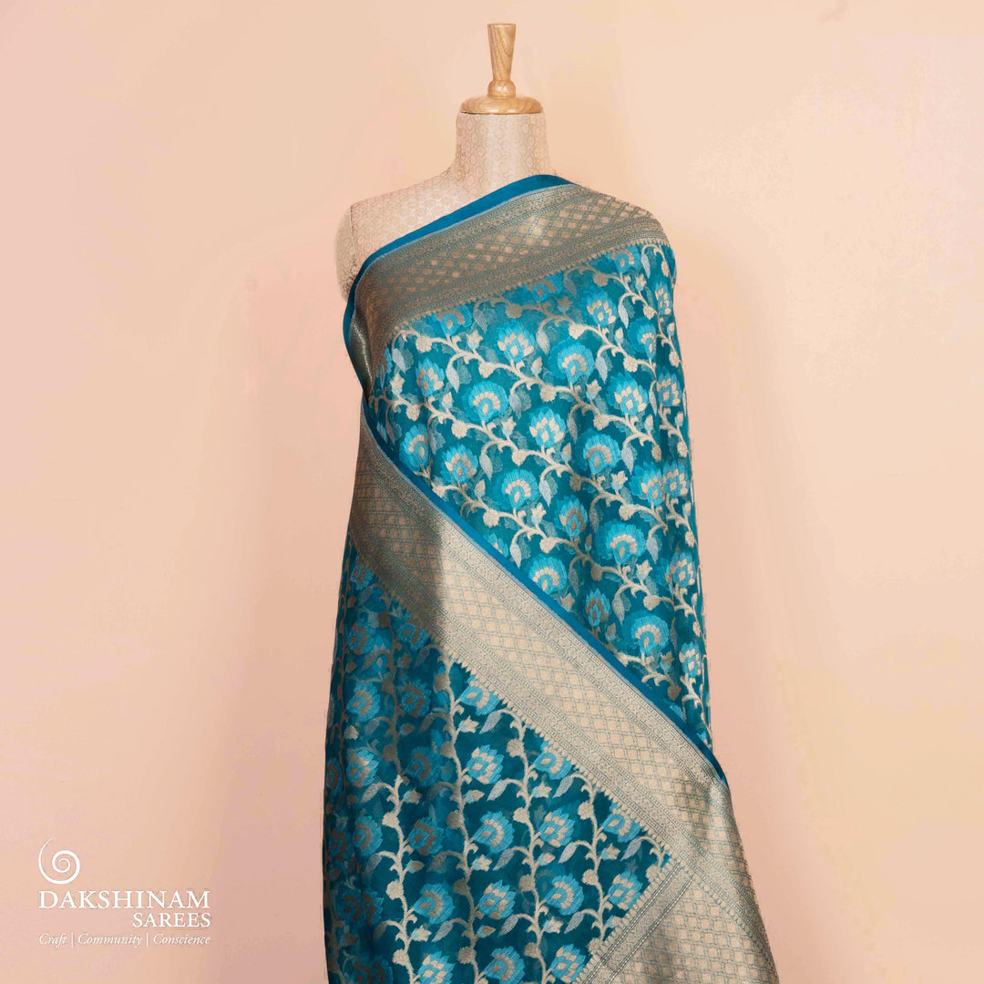 Pleats/body of Handwoven teal blue kora silk Saree