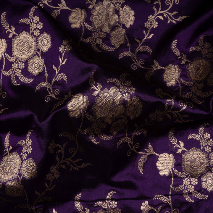 Purple fabric with gold floral embroidery