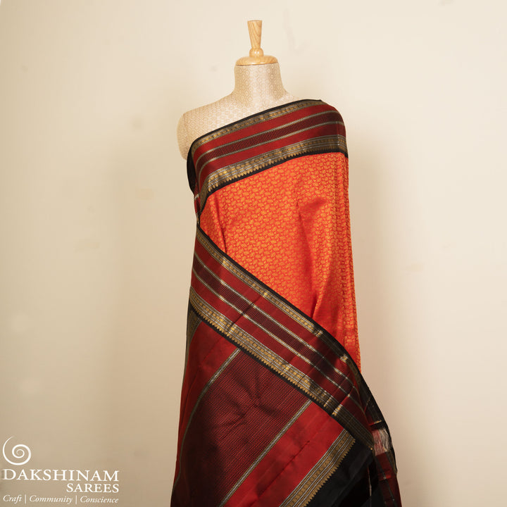 Pallu of Handwoven orange kanjivaram silk Saree