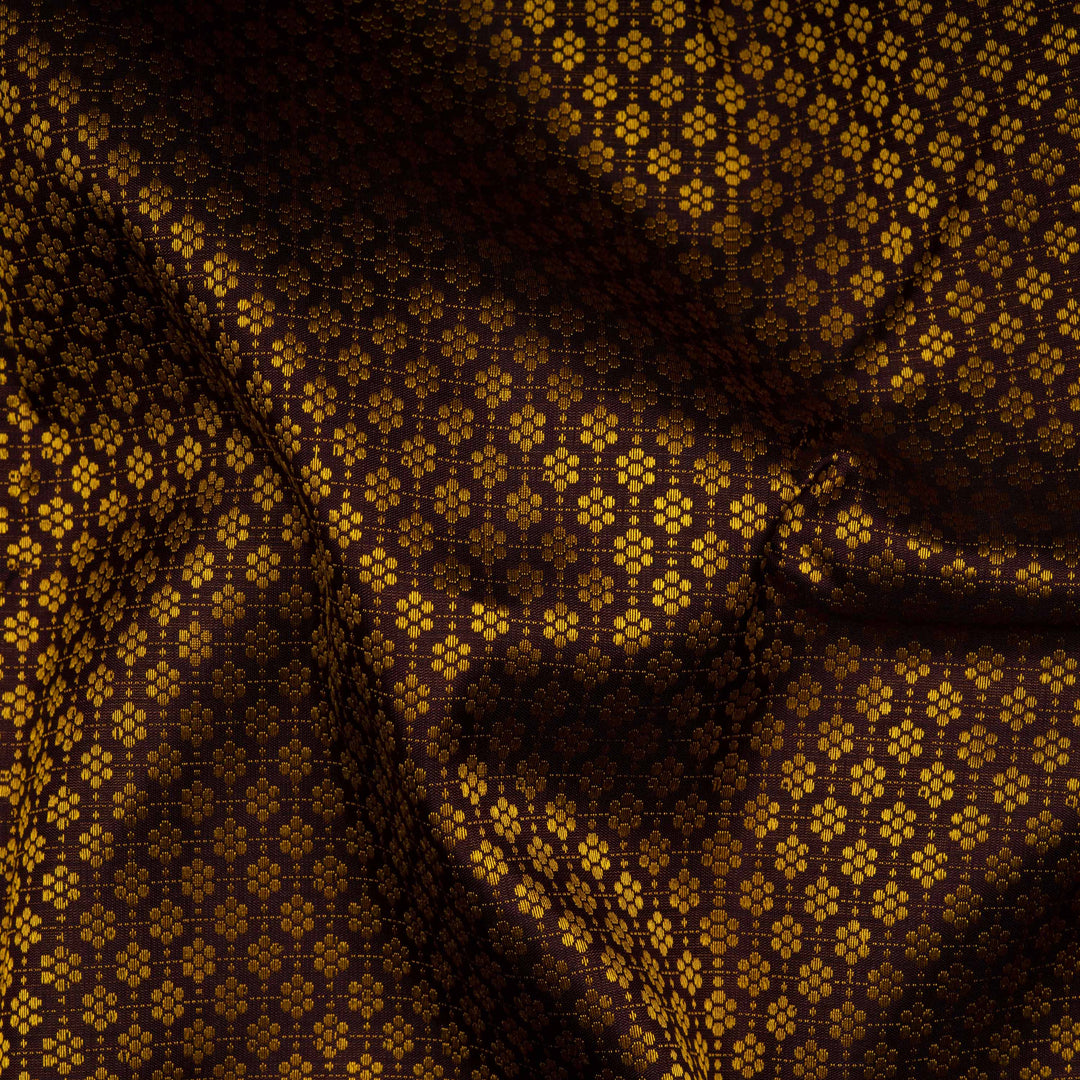 Closeup of Handwoven brown korvai kanjivaram silk Saree