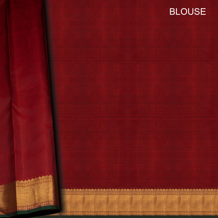 Red blouse with a gold border on a plain background