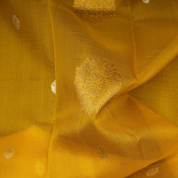Closeup of Handwoven yellow kora kanjivaram silk Saree