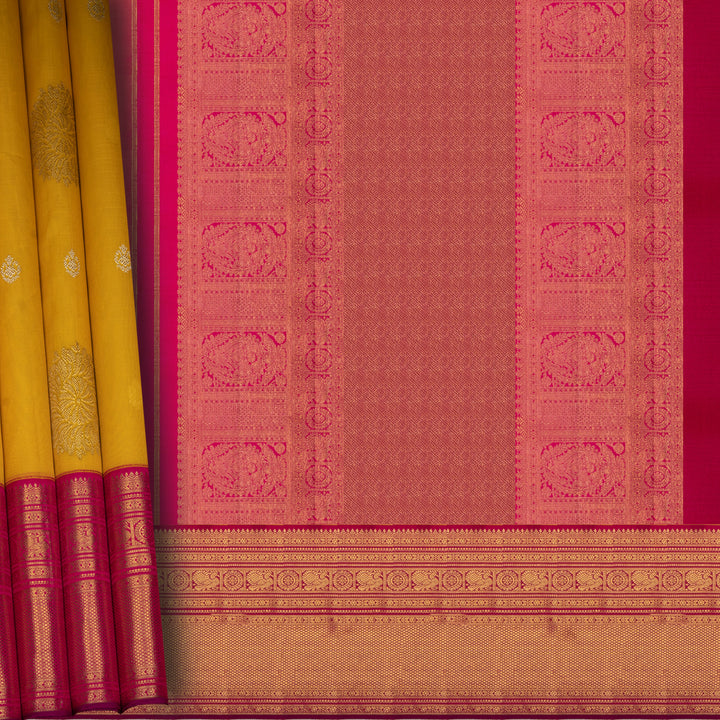 Traditional saree with pink and yellow border and patterns