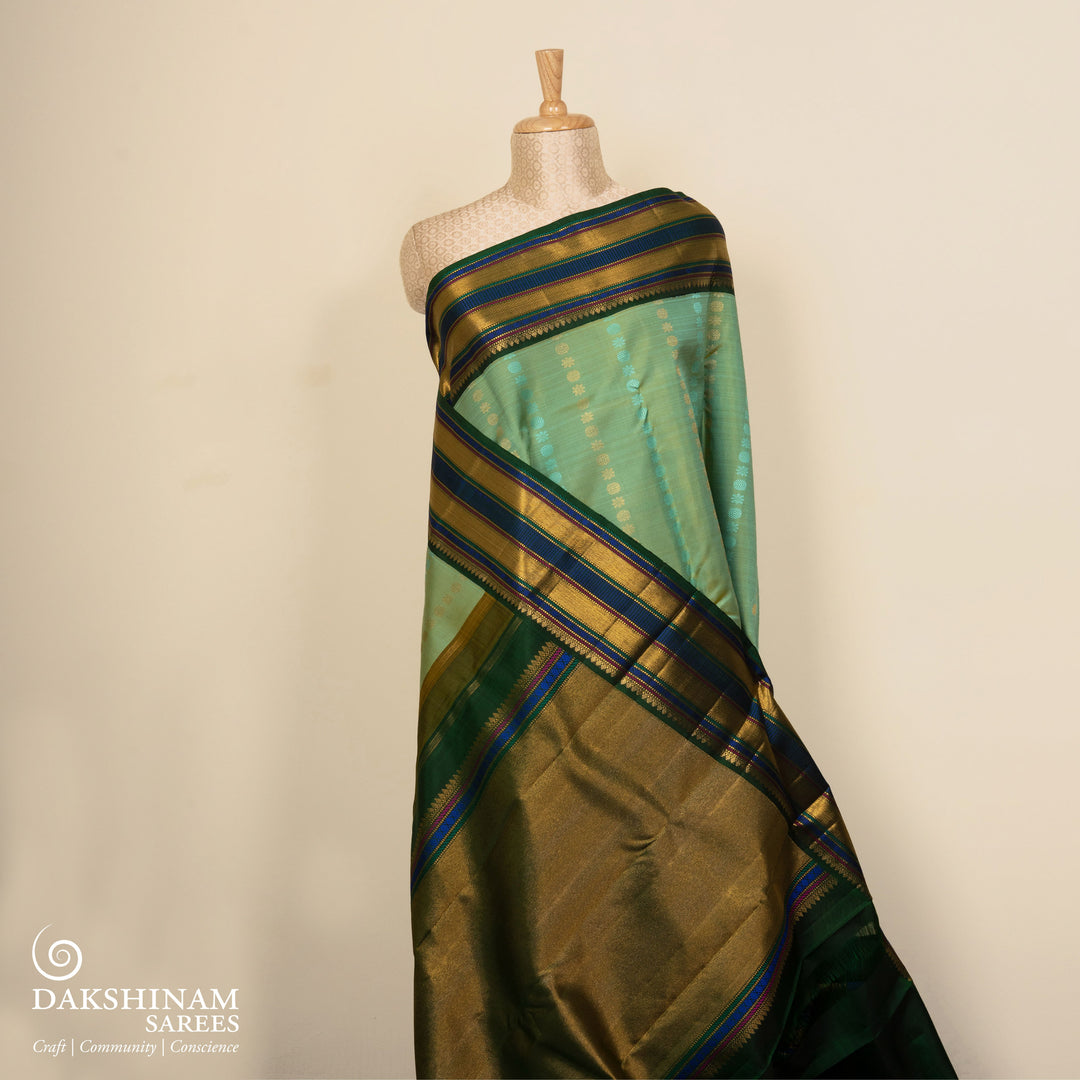 Pleat/body of Handwoven aqua green kanjivaram silk Saree