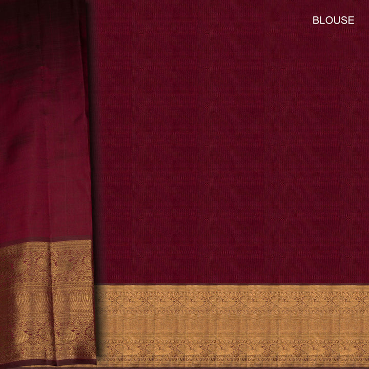 Maroon fabric with gold border and text 'BLOUSE' on a dark background