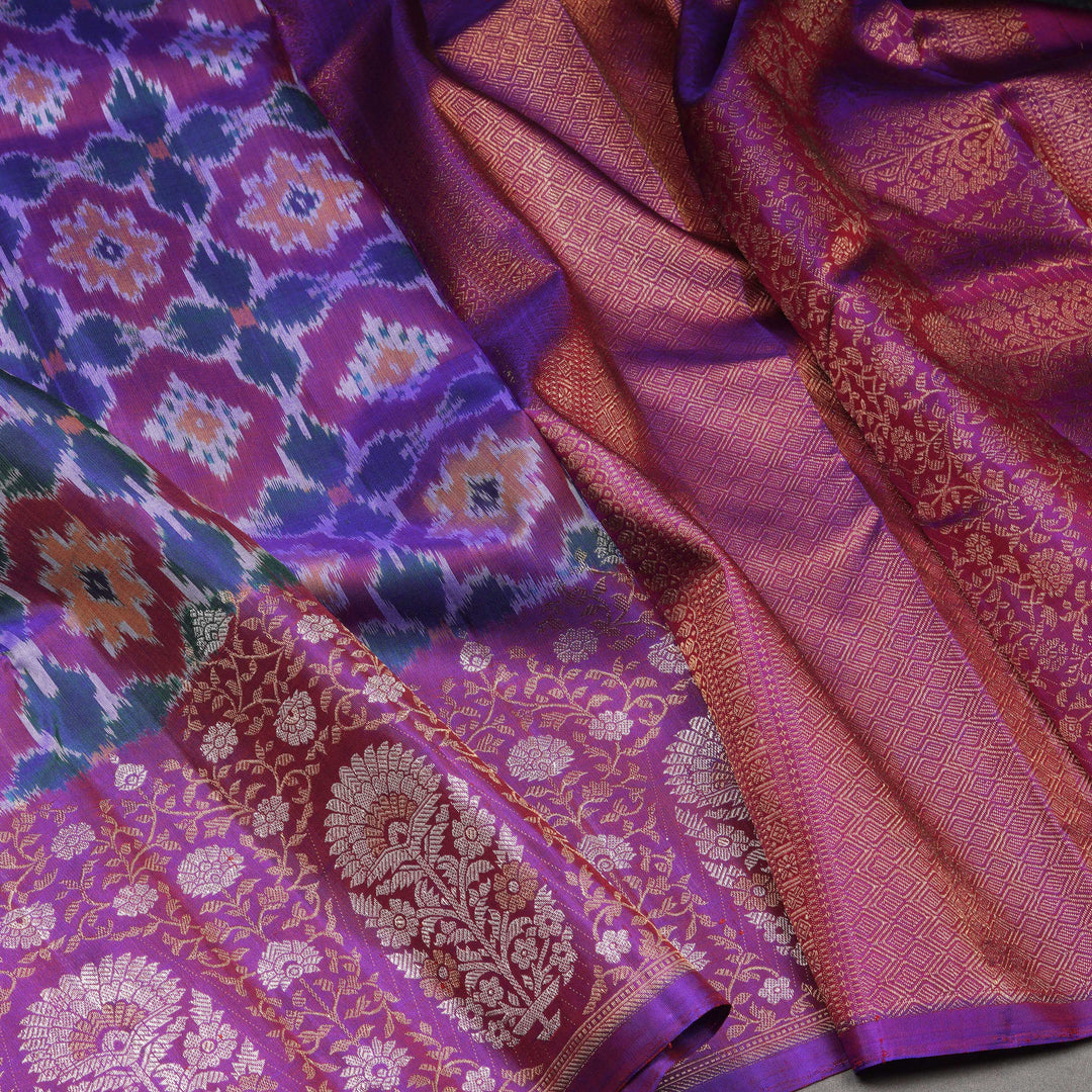 Body design of Handwoven Ikat Kanjivaram silk saree in purple color