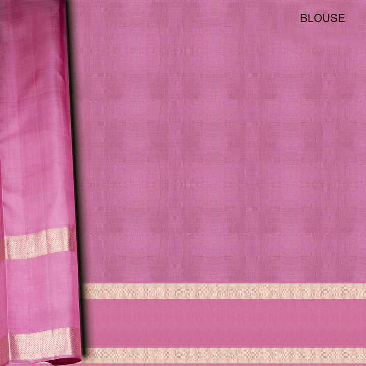 Purple blouse fabric with a gold border on a plain background