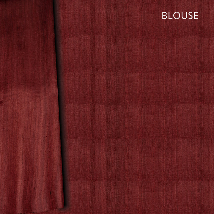 Close-up of a red blouse fabric with a checkered pattern