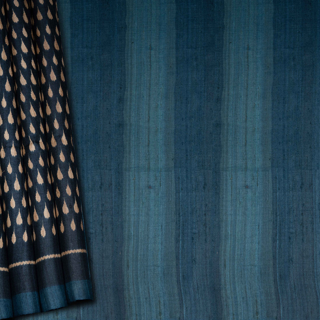 Blue fabric with a patterned edge on a blue background