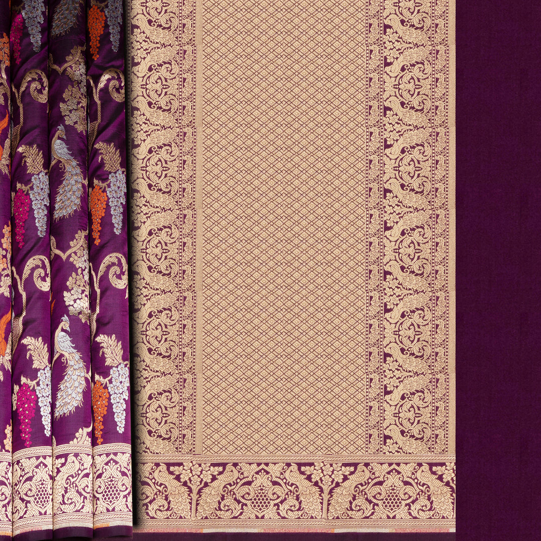 Decorative fabric with intricate patterns on a purple background