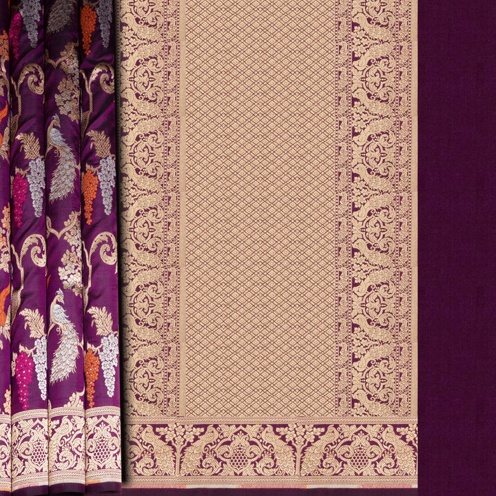 Decorative fabric with intricate patterns on a purple background