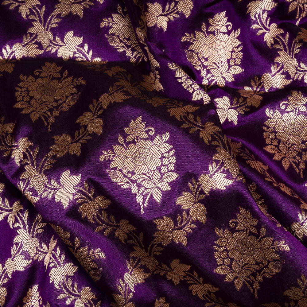 Purple fabric with gold floral patterns