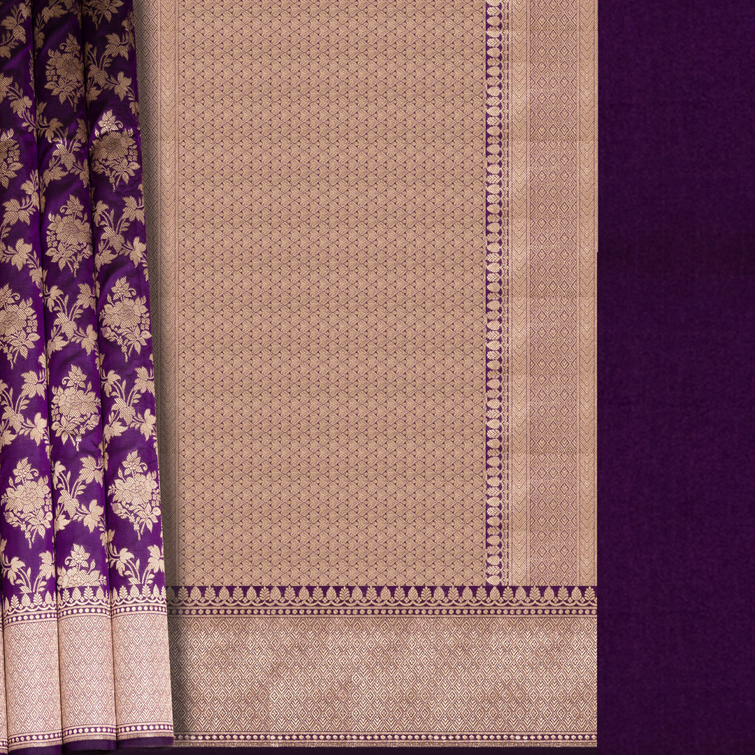Saree with purple and beige patterns on a plain background