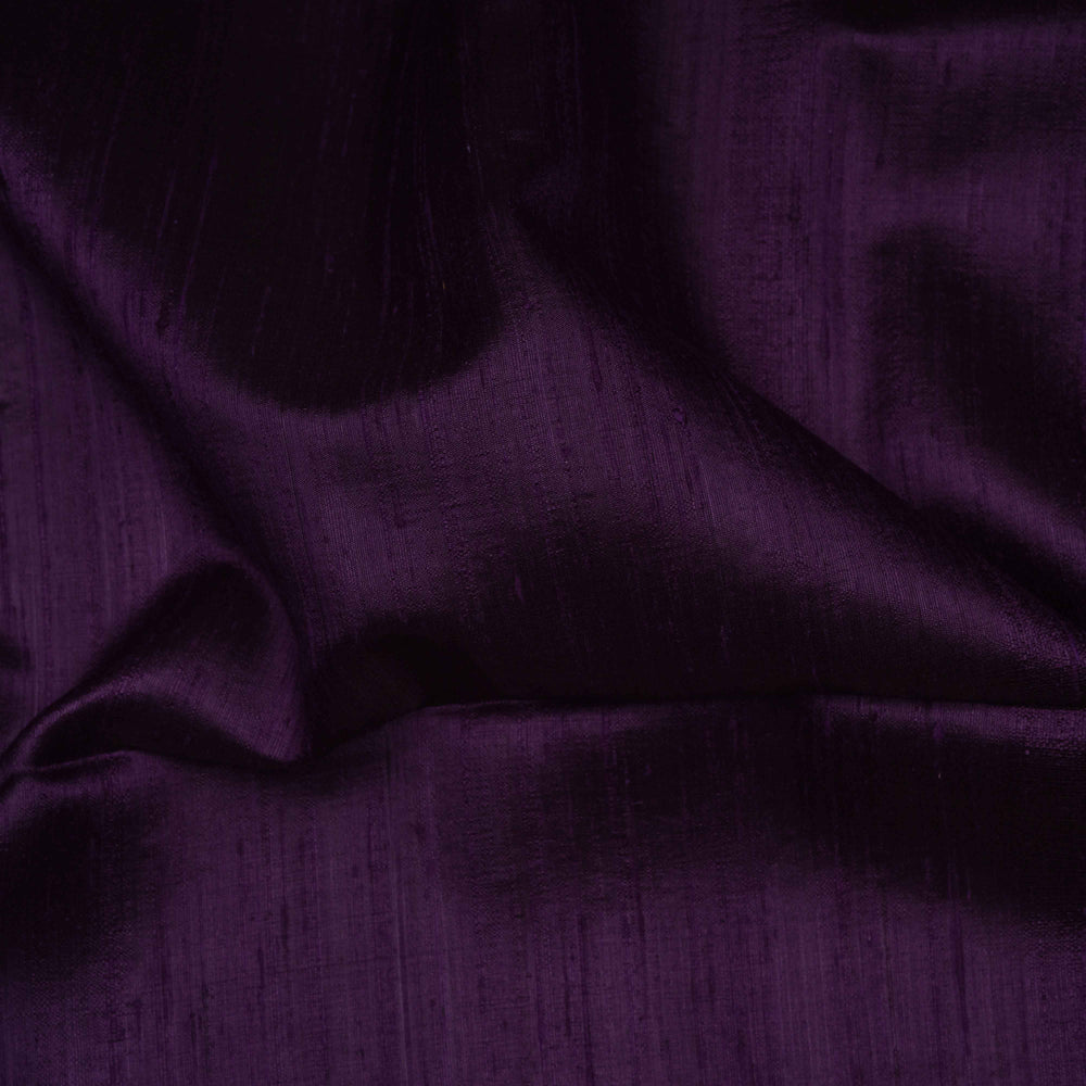 Close-up of dark purple fabric with visible texture