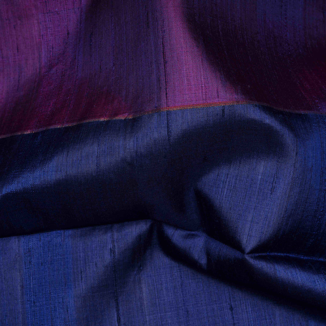 Close-up of purple and blue fabric with a textured pattern