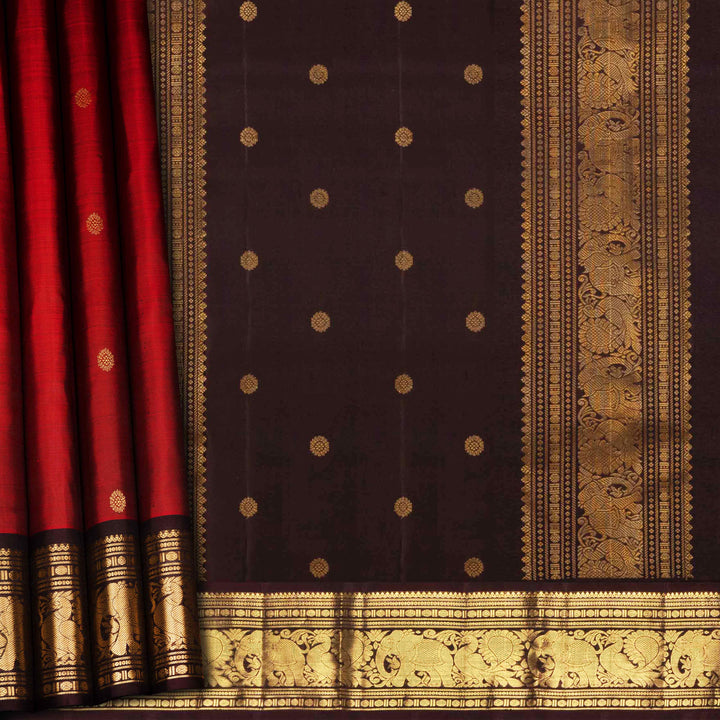 Traditional saree with red and black patterned fabric