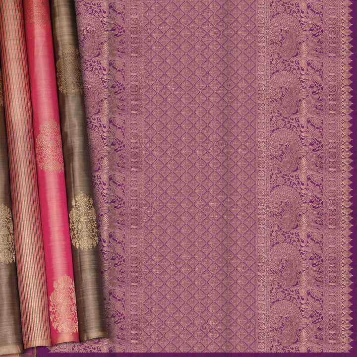 Purple fabric with intricate patterns and borders