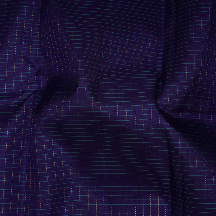 Close-up of dark blue fabric with subtle grid pattern