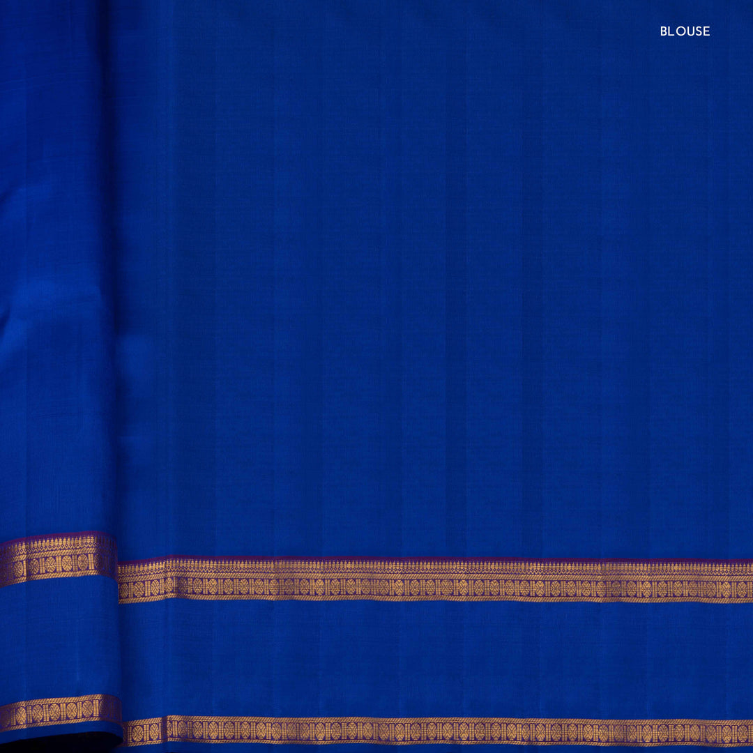 Blue fabric with gold border, labeled 'BLOUSE'.