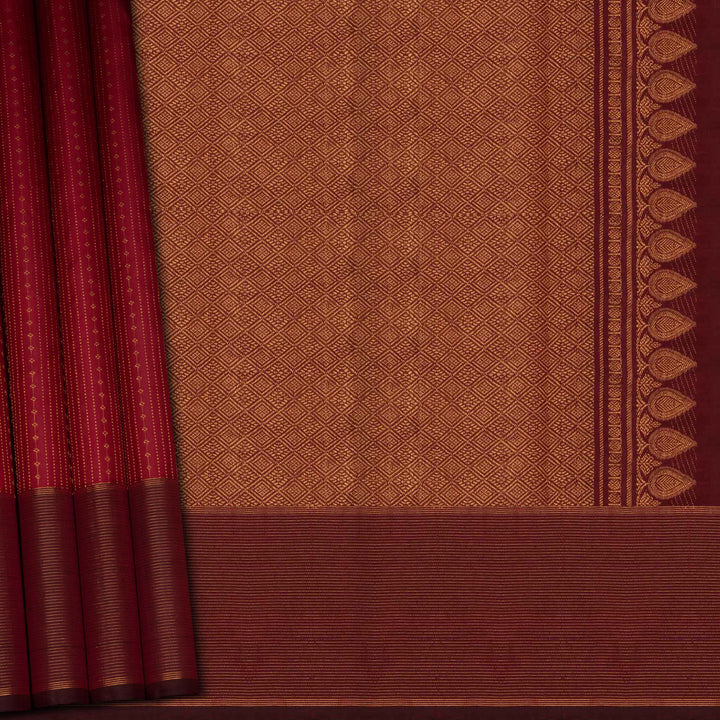 Brown fabric with a geometric pattern and red border