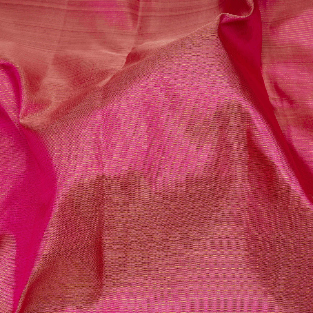 Close-up of pink fabric with a textured pattern