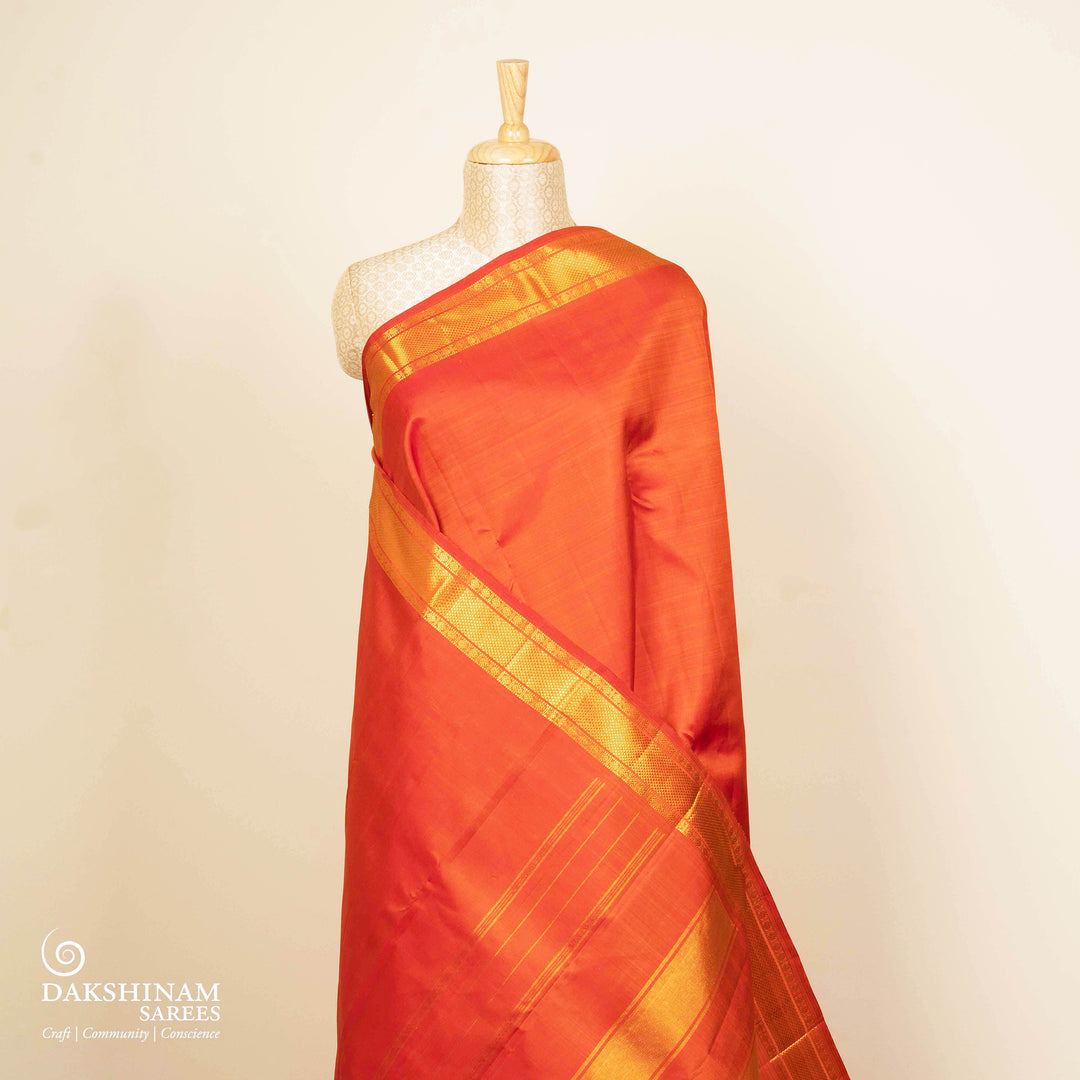 Pleats/body of Handwoven Orange Kanjivaram silk Saree
