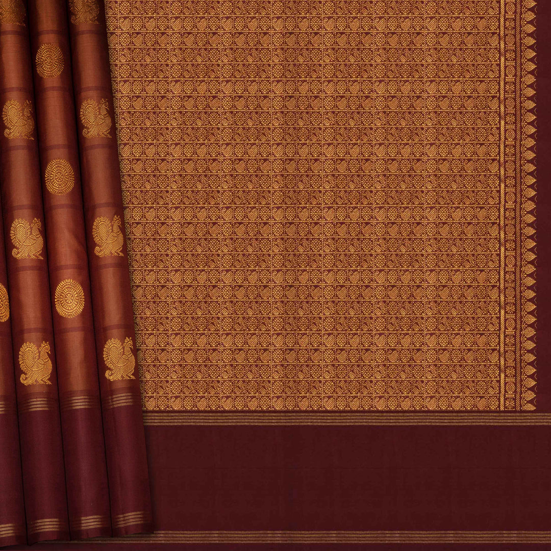 Brown fabric with gold patterns and border