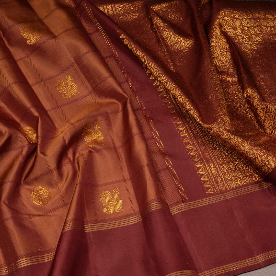 Brown fabric with gold embroidery and patterns