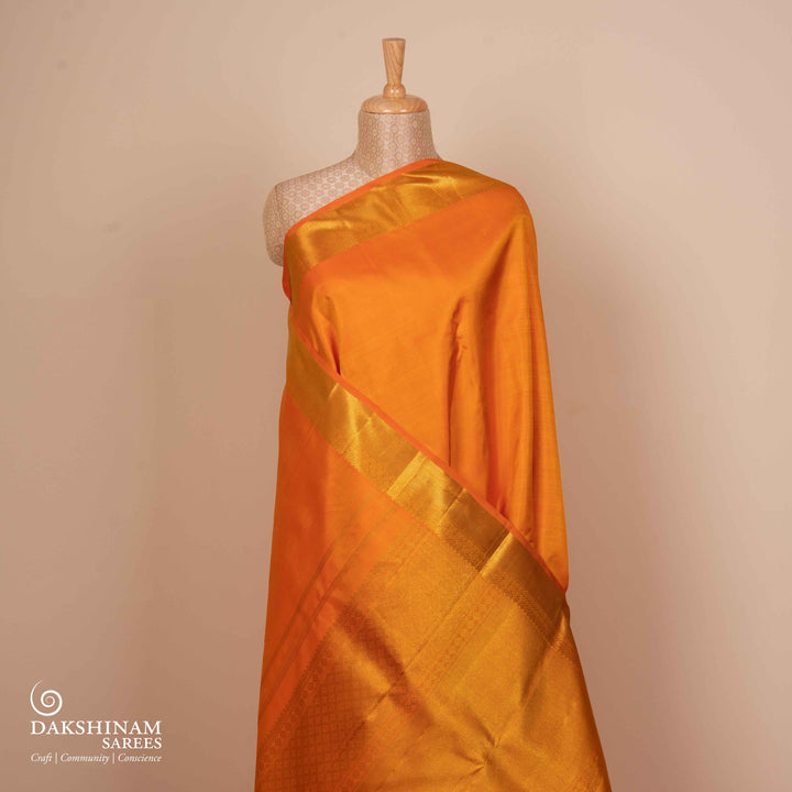 Pleats/body of Handwoven Orange Kanjivaram silk Saree