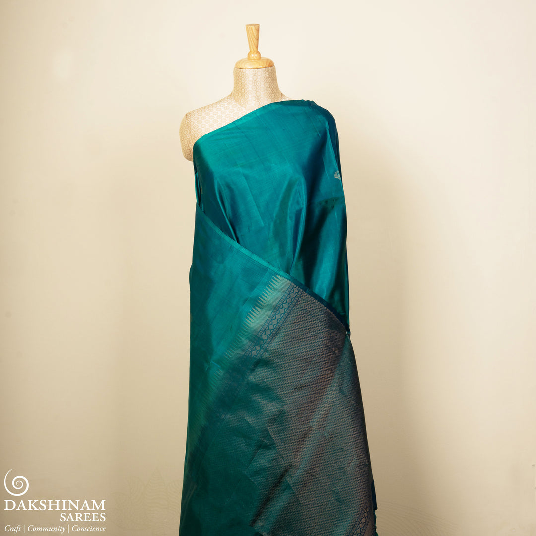 Pleats/body of Handwoven Peacock Blue with Peacock Green color Soft silk Saree