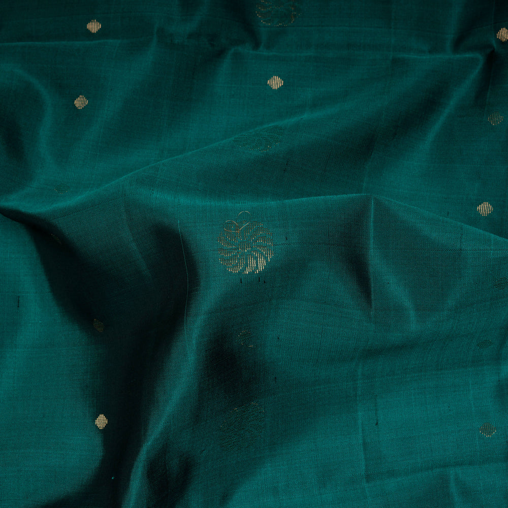 Closeup of Handwoven Peacock green color Soft silk Saree